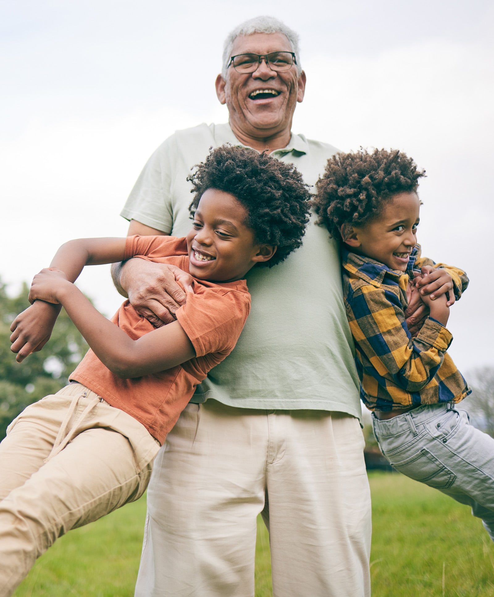 Grandpa with his grandkids in the happy playing